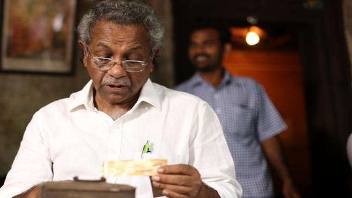 Shaji N. Karun reviewing material
